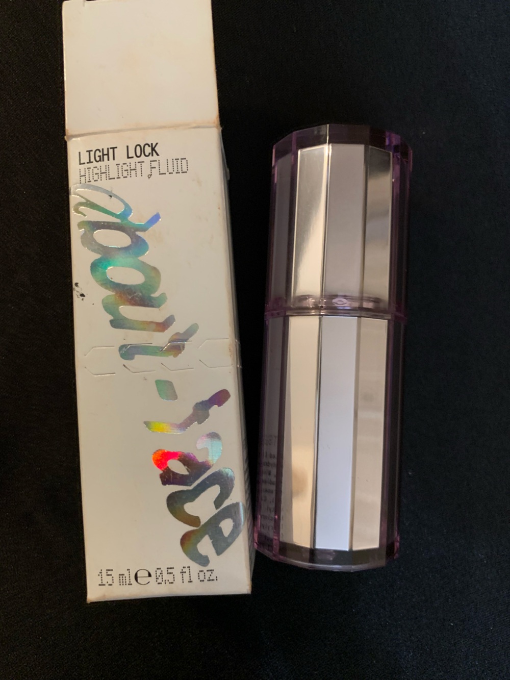 Iridescent Tube with Reflective Silver Panels